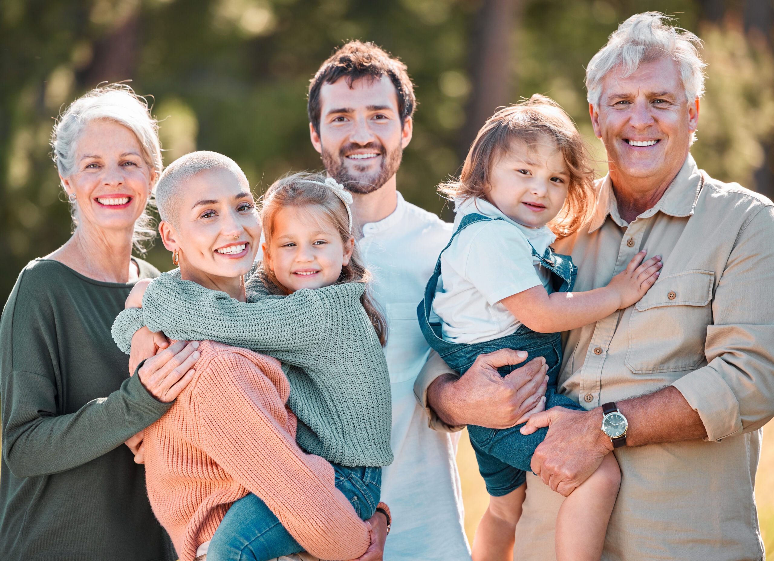 This is all of us. Shot of a multi-generational family posing together outdoors